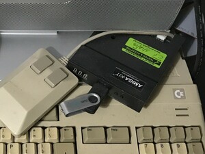 Gotek floppy emulator balanced on the Amiga
