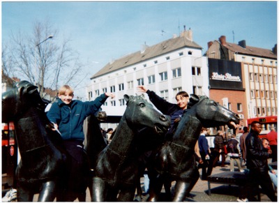 Kayvan and Me, riding horse statues, somewhere in Germany, in the 1990s